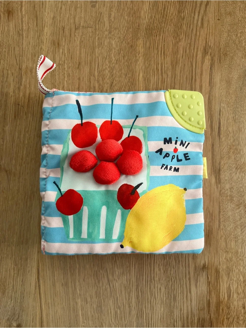 Manhattan Toy Mini Apple Farm soft crinkle activity book toy teether fruit veg